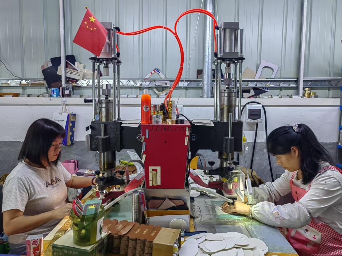 Makers working on leather goods